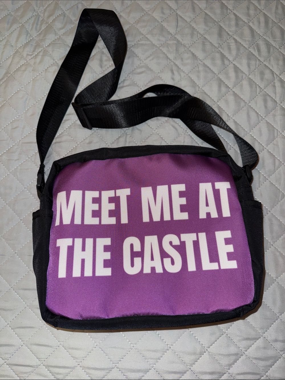 Purple Crossbody Bag with White 'MEET ME AT THE CASTLE' Print